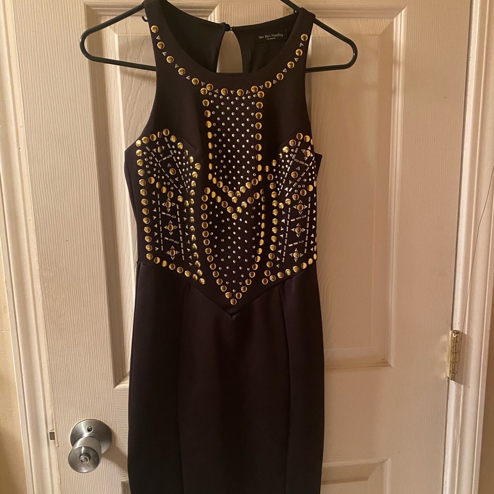 Black dress with gold and silver stud detailing